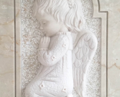 Angel in low relief
