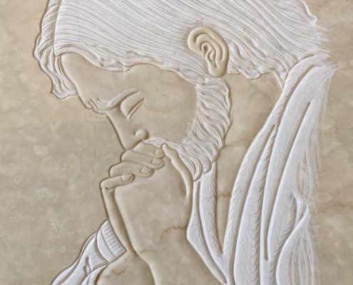 Christ in prayer in low relief
